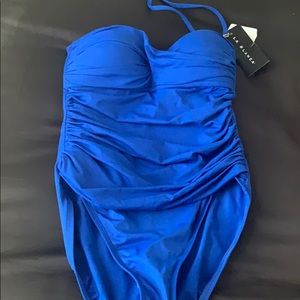 rouched mid section. Detachable Halter.